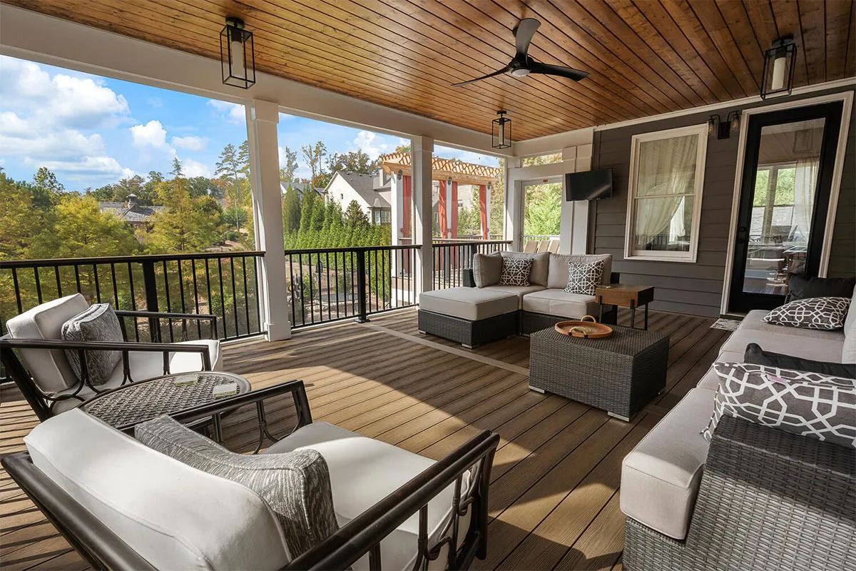 A completed porch project for an existing deck by a deck builder for a home in Sandy Springs near Marietta, GA.