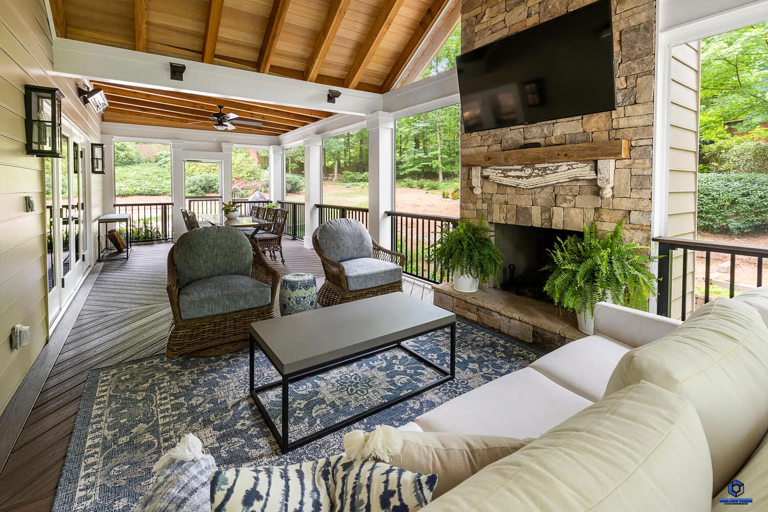 A porch and existing deck that has been renovated as the next outdoor living space by deck builder in Sandy Springs
